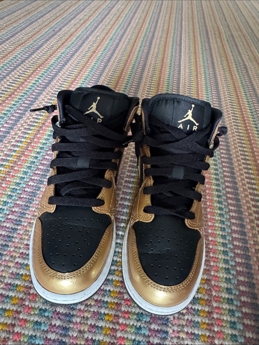 Nike Air Jordan High-Top Sneakers in Black and Gold